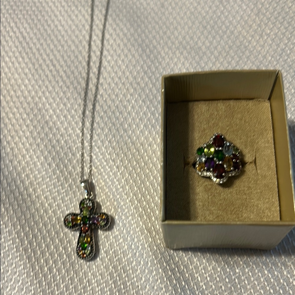 Green and Purple Cross Necklace with Emerald ring set. Lighting is too dark. JTV